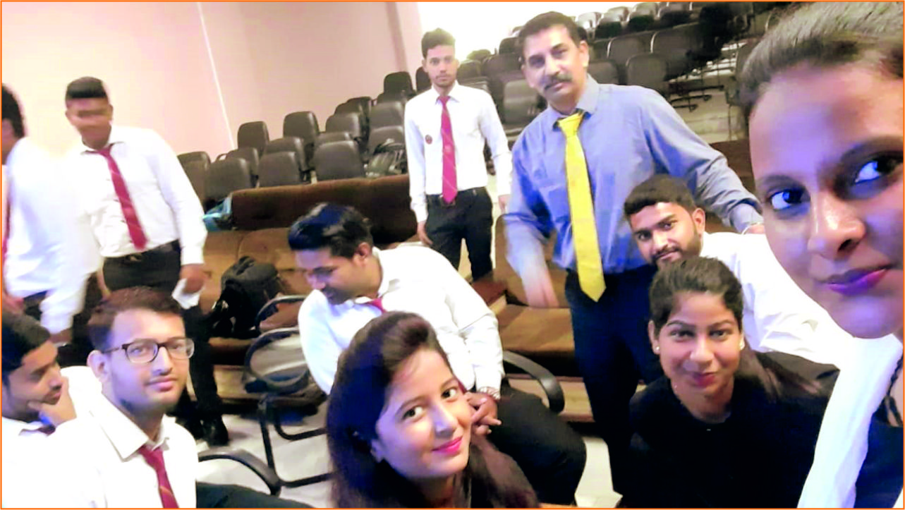 TMU college of management class with faculty