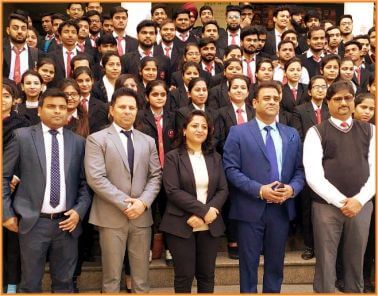 TMU college of management students group photo with faculty