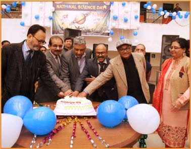 TMU faculty cake cutting